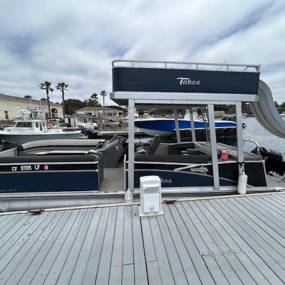 multi-colored-moored-boats-water